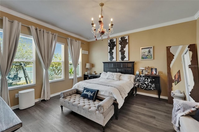 bedroom with dark wood-style flooring, crown molding, baseboards, and a notable chandelier