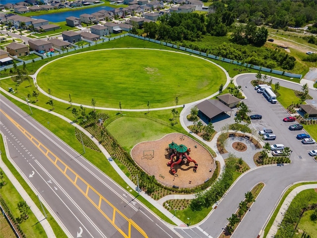aerial view with a residential view and a water view
