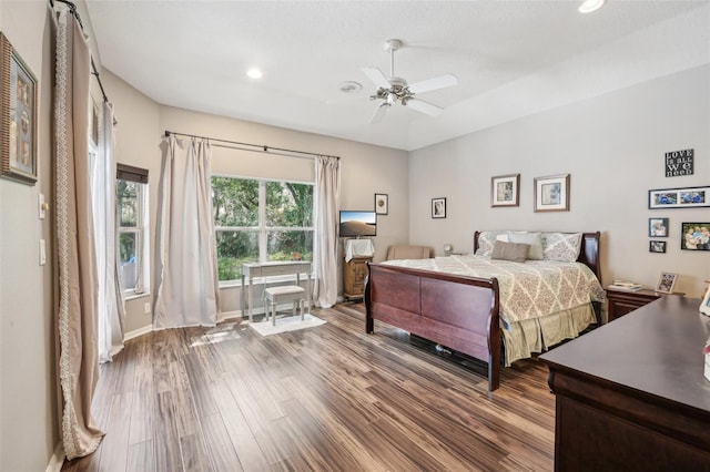 bedroom featuring recessed lighting, baseboards, ceiling fan, and wood finished floors