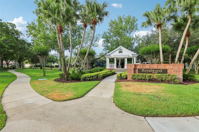surrounding community with a yard