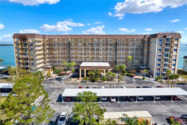 9 Haig Pl Unit 510, Dunedin, FL 34698 - view of property featuring a water view and uncovered parking