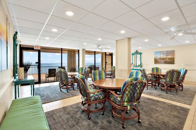 9 Haig Pl Unit 510, Dunedin, FL 34698 - dining space featuring a wall of windows, ceiling fan, and recessed lighting