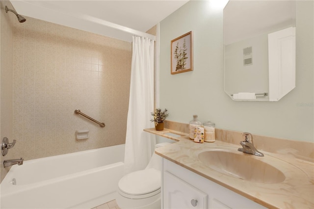 9 Haig Pl Unit 510, Dunedin, FL 34698 - bathroom with toilet, visible vents, shower / bath combo with shower curtain, and vanity