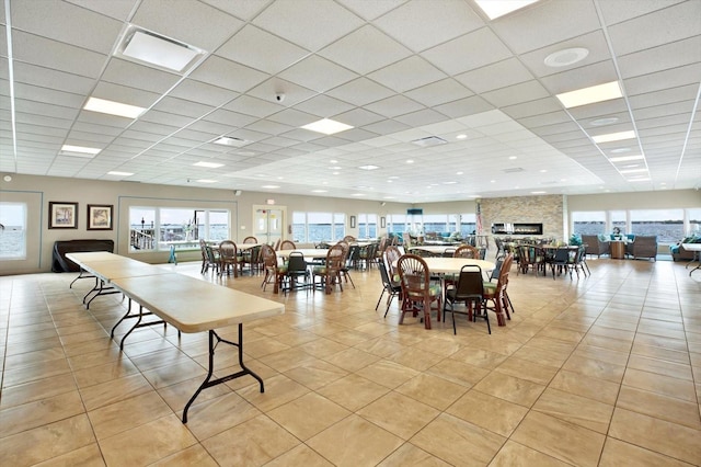 9 Haig Pl Unit 510, Dunedin, FL 34698 - dining room with a drop ceiling and light tile patterned flooring
