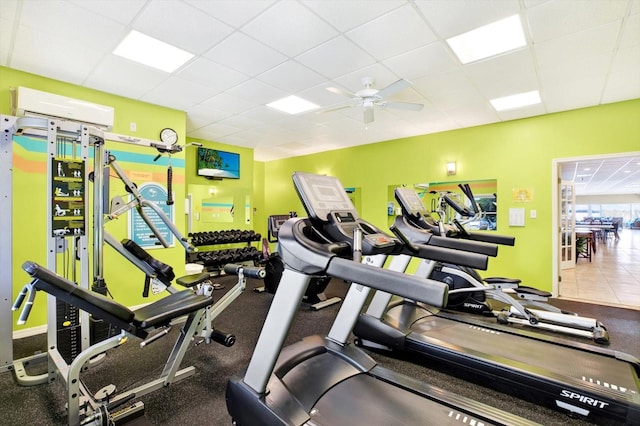 9 Haig Pl Unit 510, Dunedin, FL 34698 - gym featuring a ceiling fan, baseboards, and a drop ceiling