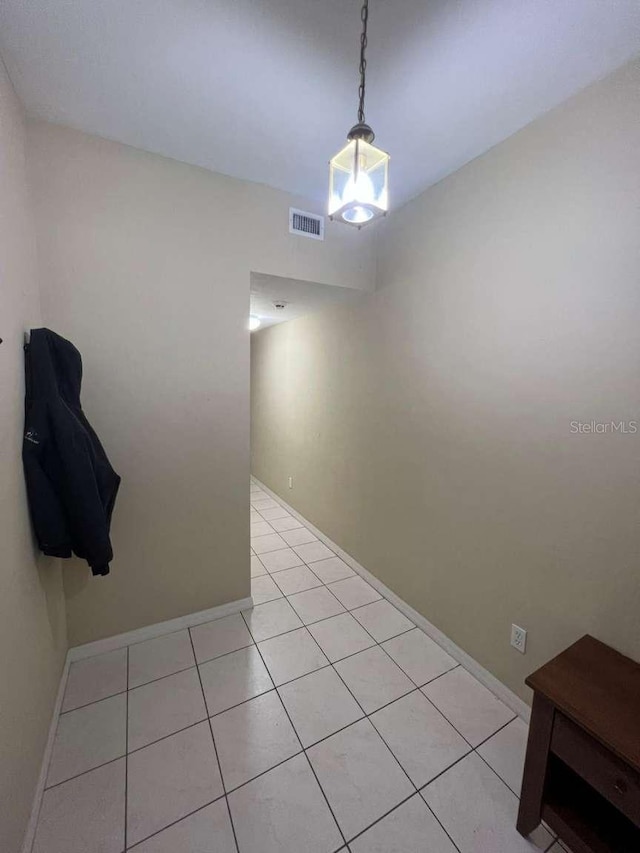 554 NW 50th Blvd, Gainesville, FL 32607 - spare room featuring visible vents, baseboards, and light tile patterned floors