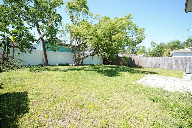view of yard featuring a fenced backyard and a patio