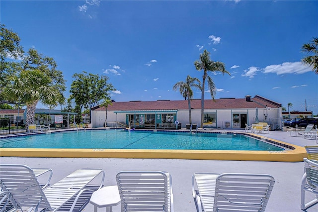 13870 Oakwood Ln Unit 13870, Seminole, FL 33776 - pool with fence and a patio