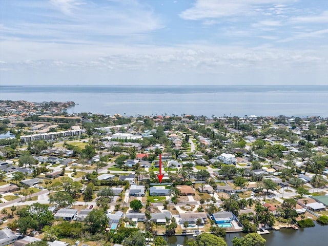 bird's eye view featuring a residential view and a water view