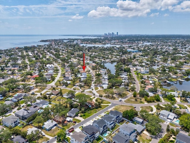 birds eye view of property featuring a residential view and a water view
