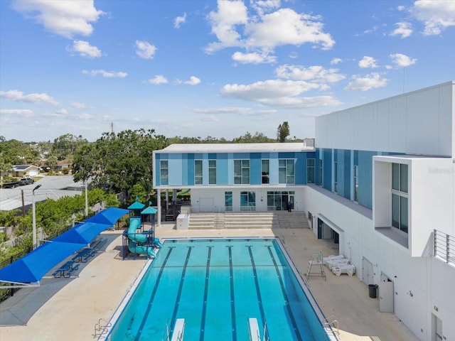 community pool with a patio