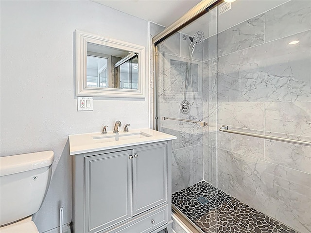 6609 Dartmouth Ave N, Saint Petersburg, FL 33710 - bathroom featuring toilet, vanity, and a stall shower