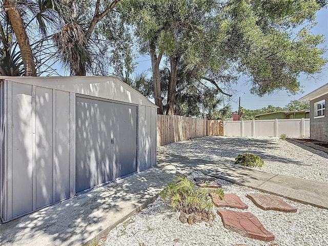6609 Dartmouth Ave N, Saint Petersburg, FL 33710 - view of shed with a fenced backyard