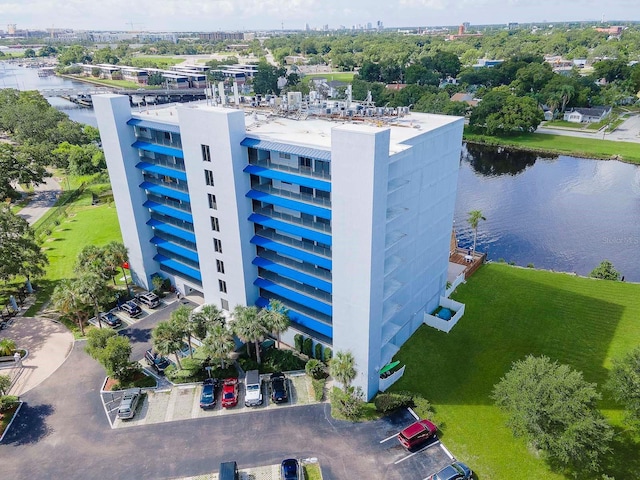 birds eye view of property with a water view