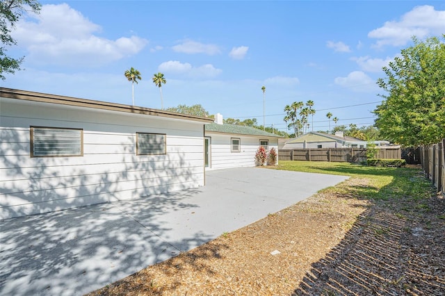 view of home's exterior with a patio area