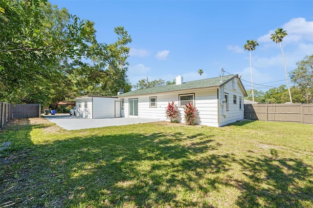 back of property featuring a patio