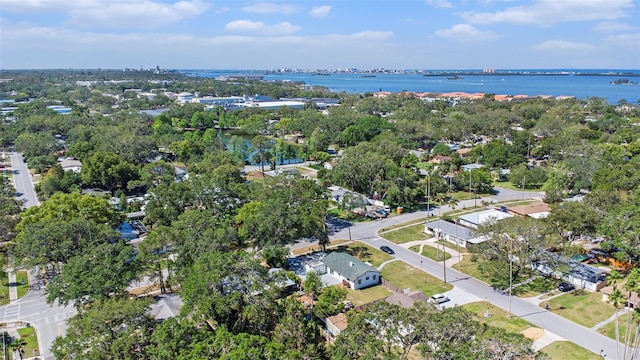 view of property location featuring a large body of water and a tree filled landscape