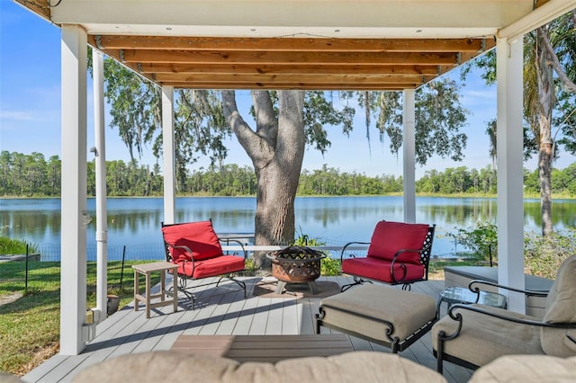 19254 Blount Rd, Lutz, FL 33558 - wooden deck with a water view and an outdoor fire pit