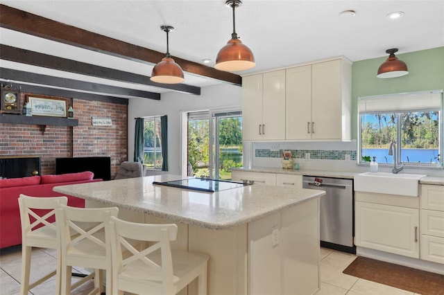 19254 Blount Rd, Lutz, FL 33558 - kitchen with dishwasher, a sink, black electric cooktop, healthy amount of natural light, and beam ceiling