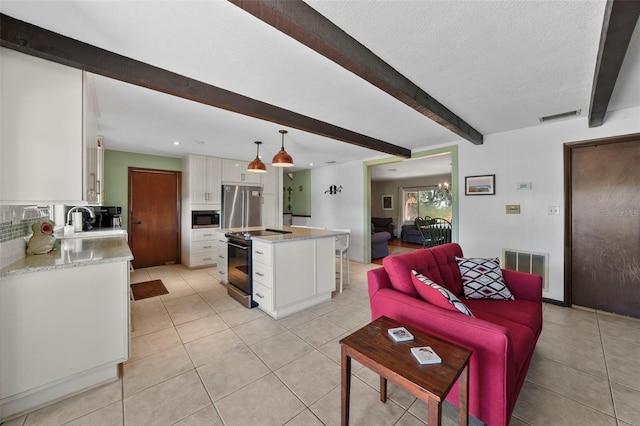 19254 Blount Rd, Lutz, FL 33558 - living area featuring beamed ceiling, light tile patterned flooring, recessed lighting, and a textured ceiling