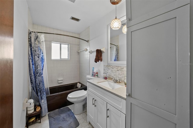 19254 Blount Rd, Lutz, FL 33558 - full bath featuring vanity, shower / tub combo with curtain, toilet, and tile patterned floors