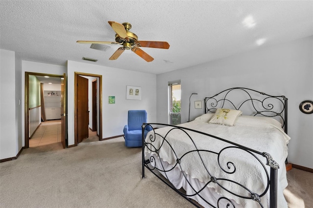 19254 Blount Rd, Lutz, FL 33558 - bedroom featuring baseboards, light colored carpet, ceiling fan, and a textured ceiling