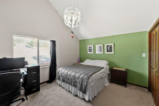 19254 Blount Rd, Lutz, FL 33558 - bedroom with vaulted ceiling, light carpet, a desk, a closet, and baseboards