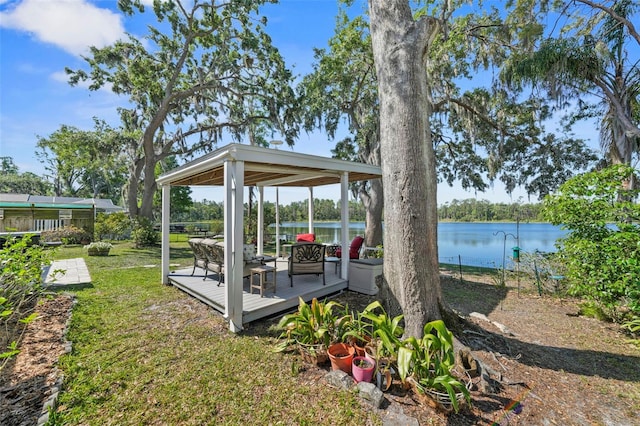 19254 Blount Rd, Lutz, FL 33558 - view of yard with a deck with water view and a gazebo