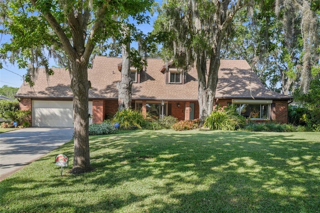 19254 Blount Rd, Lutz, FL 33558 - view of front facade with brick siding, a garage, and driveway