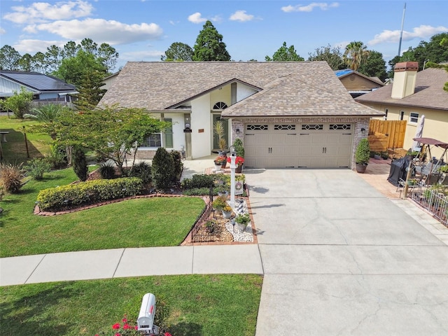 1511 Woonsocket Ln, Brandon, FL 33511 - view of front facade with an attached garage, concrete driveway, a shingled roof, and brick siding