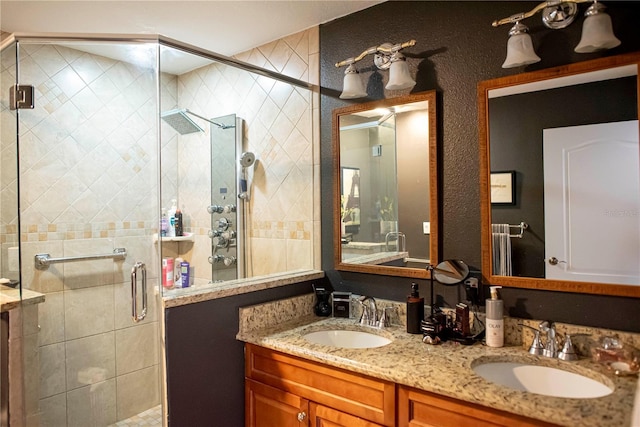 750 4th Ave S Unit 403C, Saint Petersburg, FL 33701 - full bathroom with double vanity and a stall shower