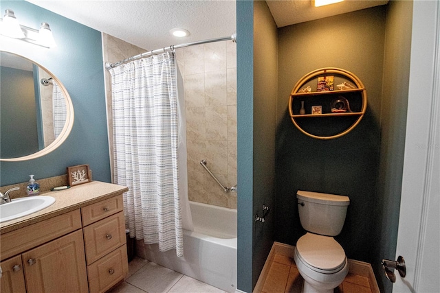 750 4th Ave S Unit 403C, Saint Petersburg, FL 33701 - bathroom with vanity, shower / bath combo, a textured ceiling, and tile patterned flooring