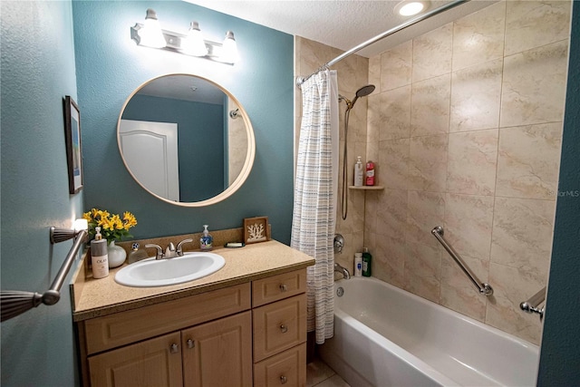 750 4th Ave S Unit 403C, Saint Petersburg, FL 33701 - bathroom with shower / bath combination with curtain, vanity, and a textured ceiling