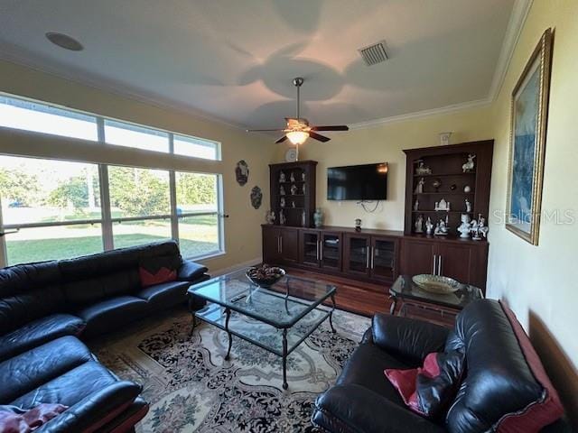17127 Brown Rd, Odessa, FL 33556 - living area featuring wood finished floors, ornamental molding, ceiling fan, and baseboards