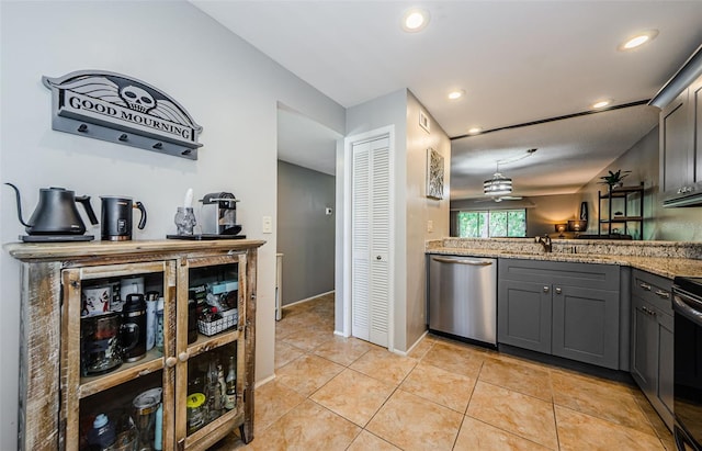 124 Nina Way Unit 24, Oldsmar, FL 34677 - kitchen featuring dishwasher, light tile patterned flooring, gray cabinets, a sink, and recessed lighting