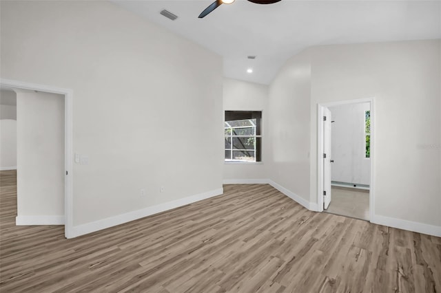 1135 Wyndham Lakes Dr, Odessa, FL 33556 - empty room with baseboards, visible vents, lofted ceiling, wood finished floors, and ceiling fan