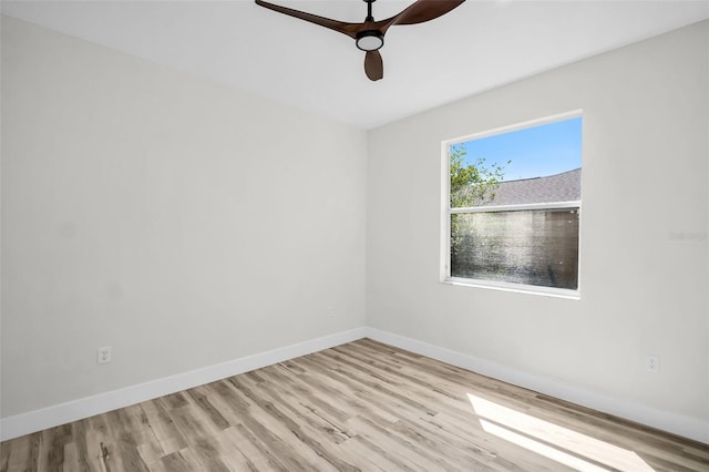 1135 Wyndham Lakes Dr, Odessa, FL 33556 - spare room with ceiling fan, baseboards, and wood finished floors