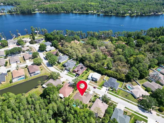 1135 Wyndham Lakes Dr, Odessa, FL 33556 - birds eye view of property featuring a water view, a residential view, and a wooded view