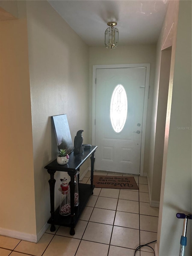 9950 Morris Brg, Tampa, FL 33637 - entryway with light tile patterned floors and baseboards