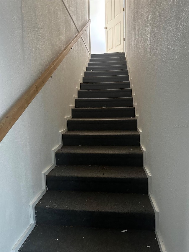 9950 Morris Brg, Tampa, FL 33637 - staircase with baseboards
