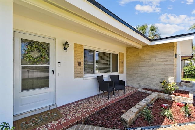 1751 Ashton Abbey Rd, Clearwater, FL 33755 - entrance to property with covered porch and brick siding