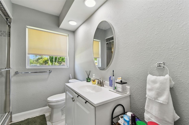 1751 Ashton Abbey Rd, Clearwater, FL 33755 - bathroom featuring vanity, an enclosed shower, and tile patterned flooring