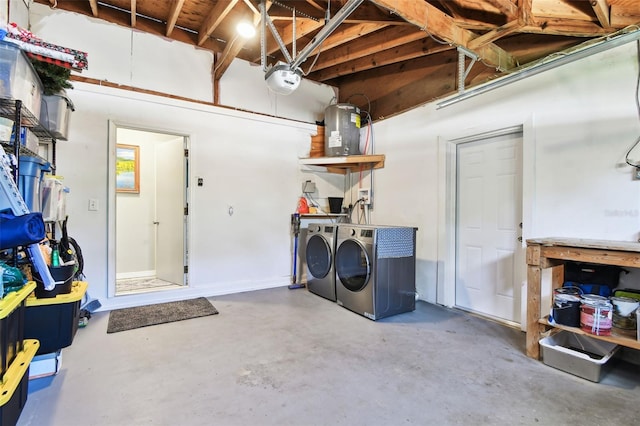 1751 Ashton Abbey Rd, Clearwater, FL 33755 - garage with washing machine and clothes dryer and a garage door opener