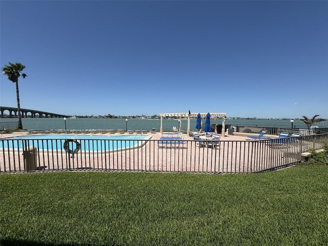6279 Sun Blvd Unit 103, Saint Petersburg, FL 33715 - pool with fence, a yard, and a patio