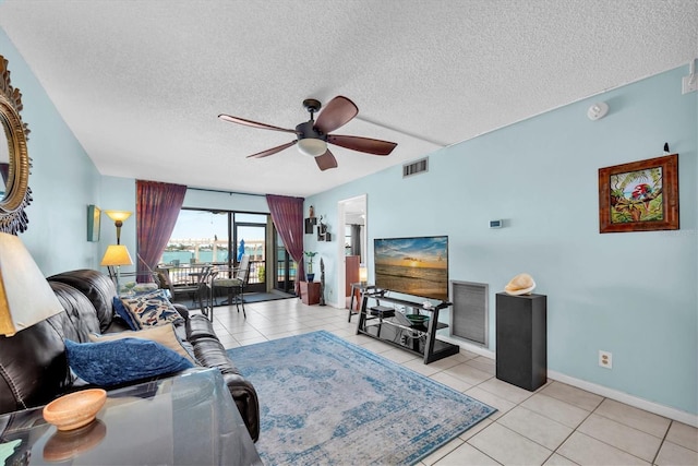 6279 Sun Blvd Unit 103, Saint Petersburg, FL 33715 - living area featuring a ceiling fan, visible vents, and tile patterned flooring