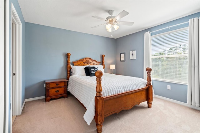 10617 Lucaya Dr, Tampa, FL 33647 - bedroom with ceiling fan, light carpet, and baseboards