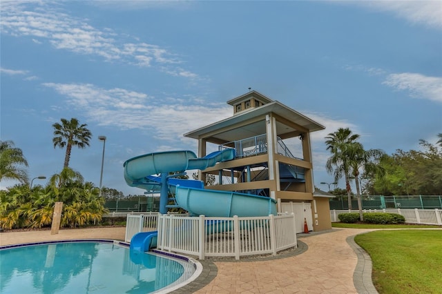 10617 Lucaya Dr, Tampa, FL 33647 - exterior space with a water slide, fence, and a fenced in pool