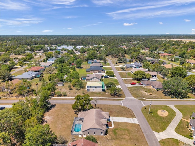 birds eye view of property with a residential view