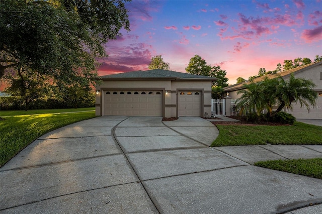 7519 Berna Ln, Land O Lakes, FL 34637 - single story home featuring driveway, stucco siding, an attached garage, and a gate