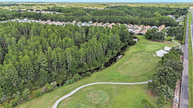 7519 Berna Ln, Land O Lakes, FL 34637 - aerial view of property and surrounding area with a golf course and nearby suburban area